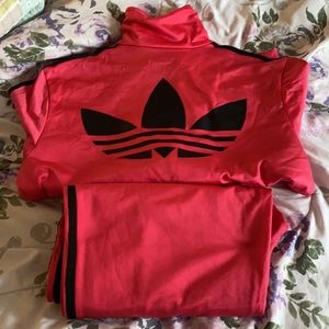 Pink And black stripe. Adidas ! Used but wear maybe 2 times